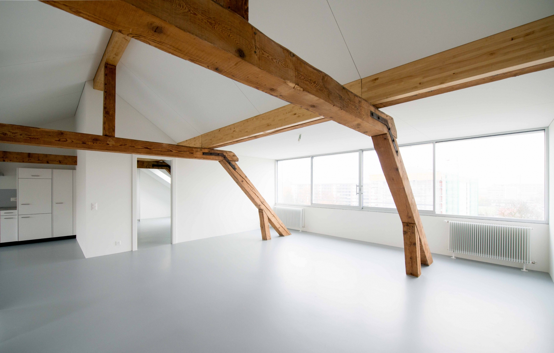 Tranformation d'appartements dans les combles d'un immeuble patrimonial à Genève, bureau d'architectes à Genève, corpus architecture urbanisme